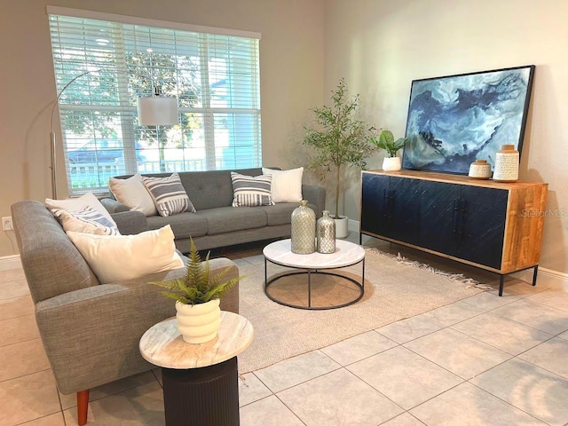 tiled living room with plenty of natural light