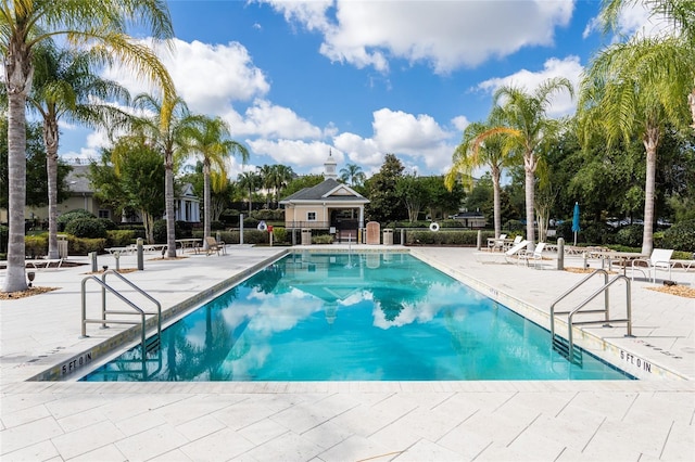 view of swimming pool with a patio area