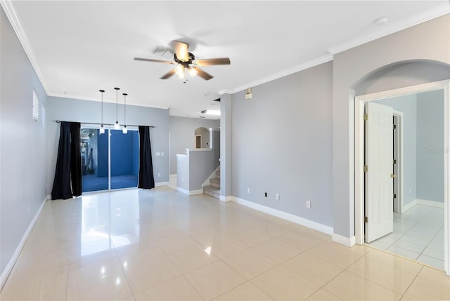 unfurnished room with ceiling fan, ornamental molding, and light tile patterned floors