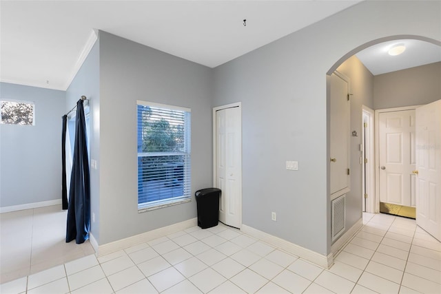 view of tiled spare room