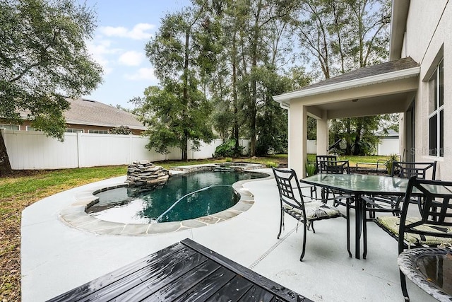 view of pool featuring a patio