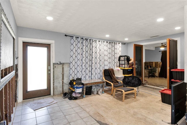 sitting room featuring light tile patterned floors