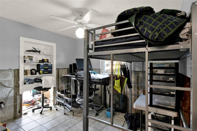 bedroom featuring light tile patterned floors, multiple windows, and ceiling fan