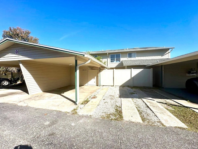 view of front facade featuring a carport