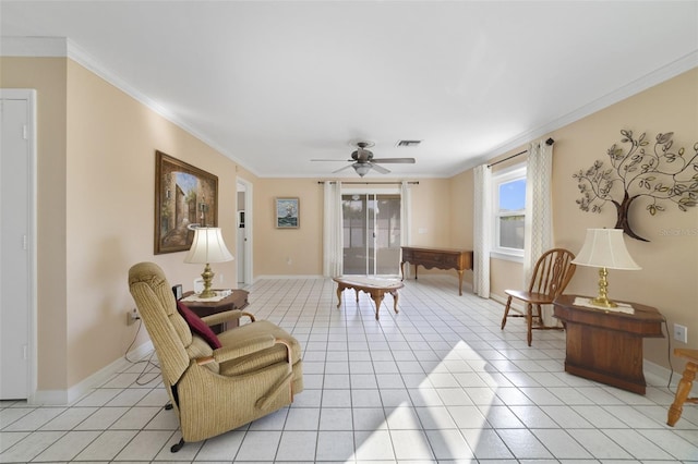 tiled living room featuring ceiling fan and ornamental molding