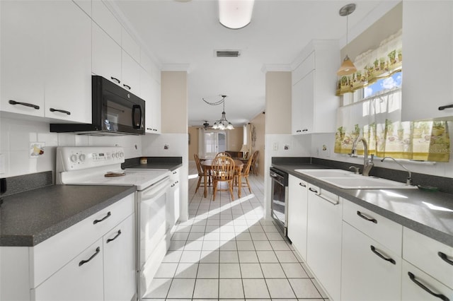 kitchen featuring black appliances, white cabinets, sink, decorative light fixtures, and light tile patterned flooring