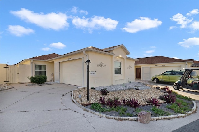 ranch-style house featuring a garage