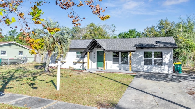 view of front of property with a front lawn