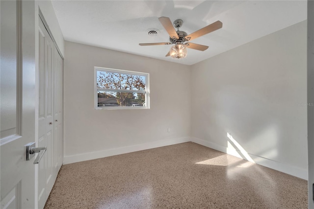 spare room featuring ceiling fan