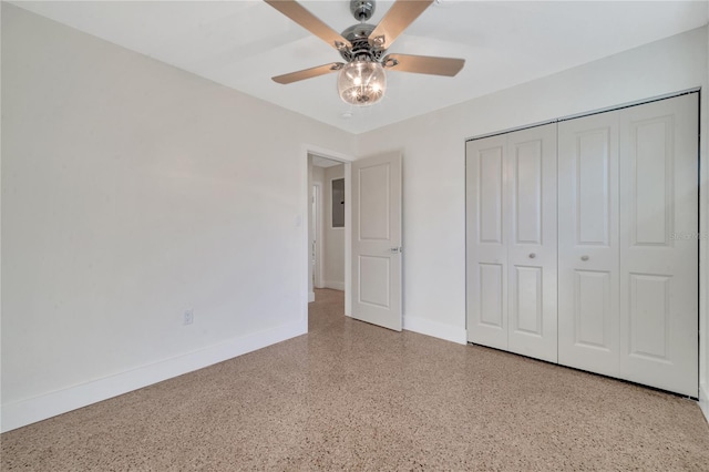 unfurnished bedroom with a closet and ceiling fan