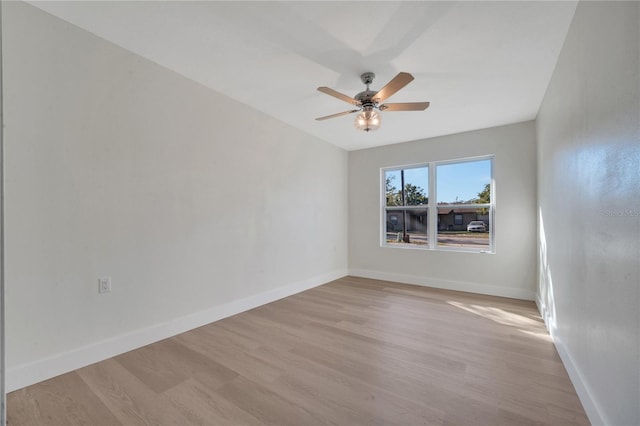 unfurnished room featuring light hardwood / wood-style floors and ceiling fan