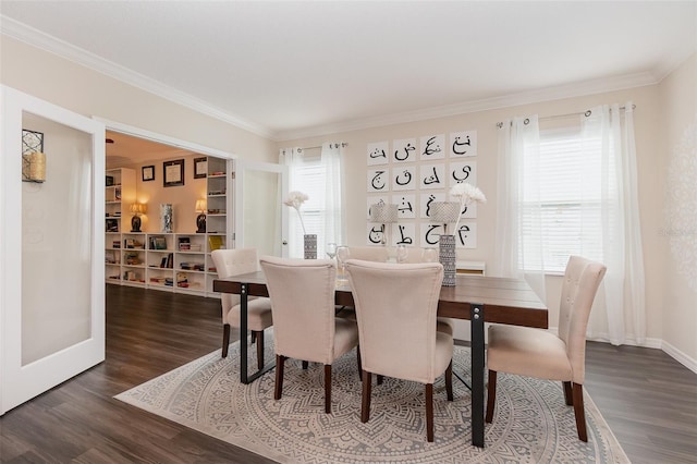 dining room with dark hardwood / wood-style flooring and ornamental molding