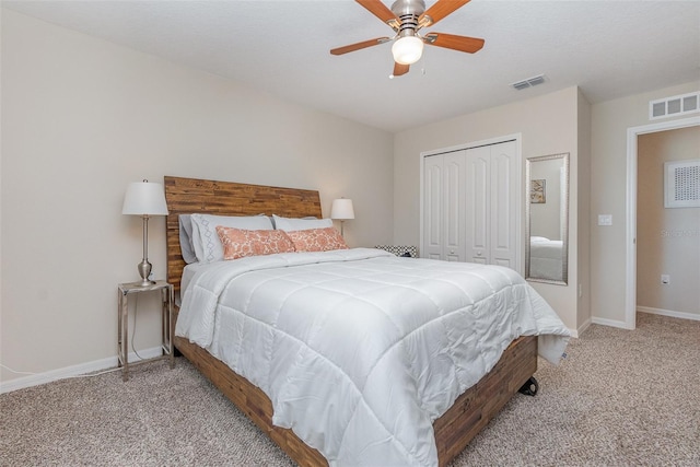 bedroom with carpet floors, a closet, and ceiling fan