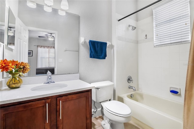 full bathroom with shower / tub combo, vanity, ceiling fan, tile patterned flooring, and toilet