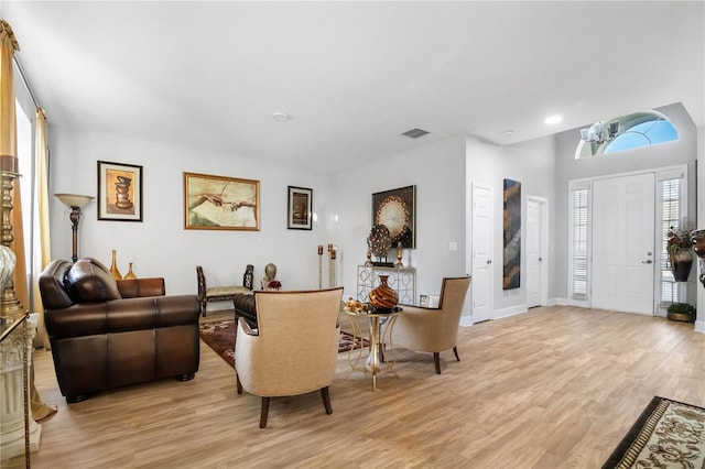 living room with light hardwood / wood-style floors