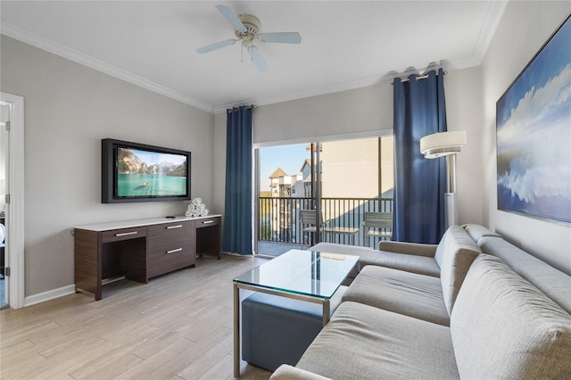 14501 Grove Resort Ave Unit 1727, Winter Garden, FL 34787 - living room featuring ornamental molding, light wood-type flooring, a ceiling fan, and baseboards