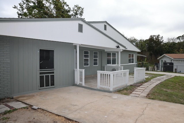 back of house featuring a patio