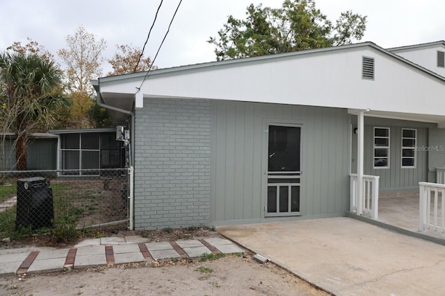 back of property with a patio area