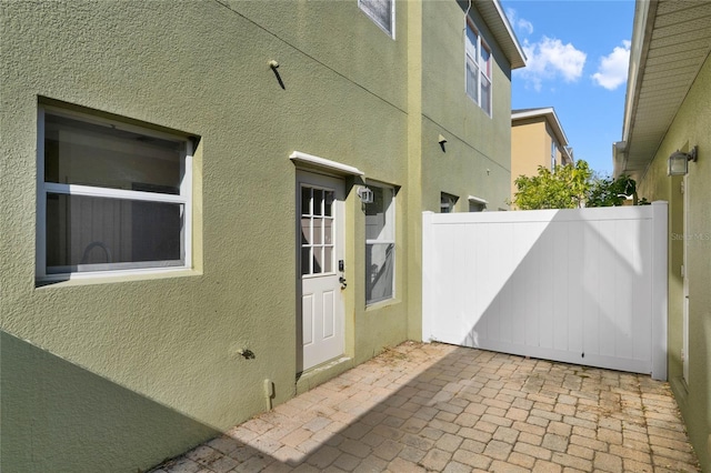 view of property exterior featuring a patio area