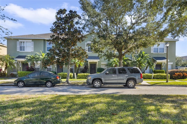 exterior space featuring a front lawn