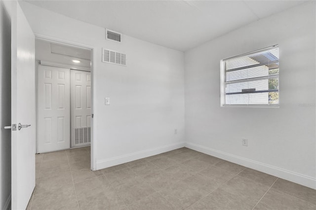 view of tiled spare room