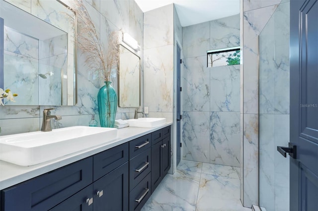 bathroom featuring a tile shower, vanity, and tile walls