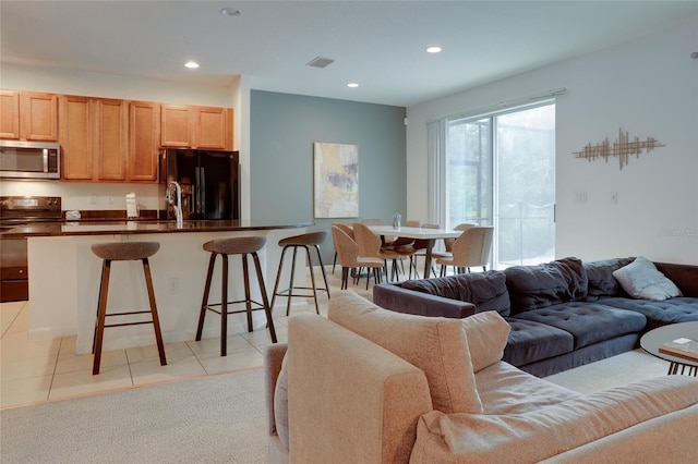 tiled living room with sink