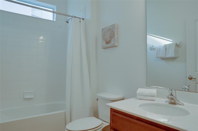 full bathroom with vanity, shower / bathtub combination with curtain, and toilet