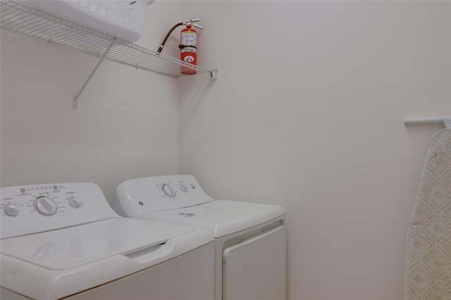 laundry room featuring independent washer and dryer