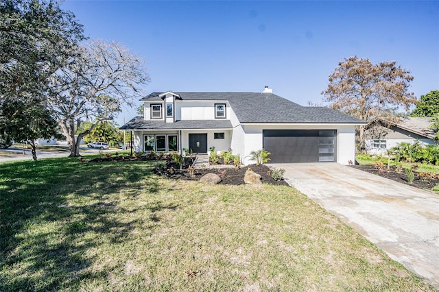 view of front of house featuring a garage, a front lawn, stucco siding, a chimney, and driveway