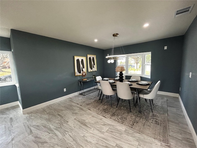 dining area with baseboards, recessed lighting, a chandelier, and visible vents