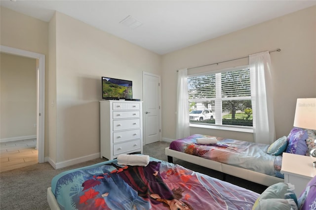 bedroom featuring carpet flooring