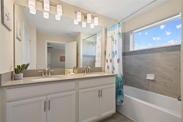 bathroom featuring tile patterned floors, vanity, and shower / bathtub combination with curtain