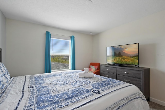 820 Pebble Beach Dr, Davenport, FL 33896 - carpeted bedroom with baseboards