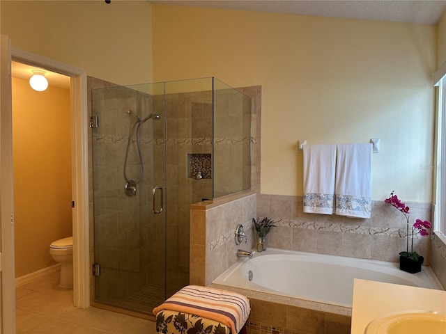 bathroom with separate shower and tub, tile patterned floors, a textured ceiling, and toilet