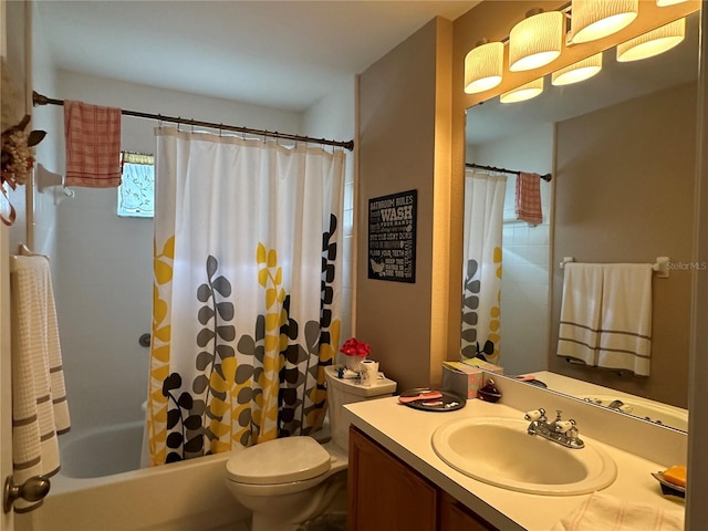 full bathroom featuring vanity, toilet, and shower / bath combo with shower curtain