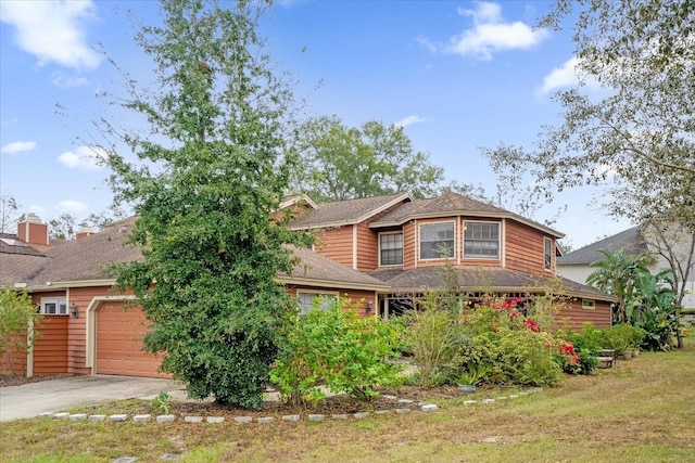 view of front of home with a garage