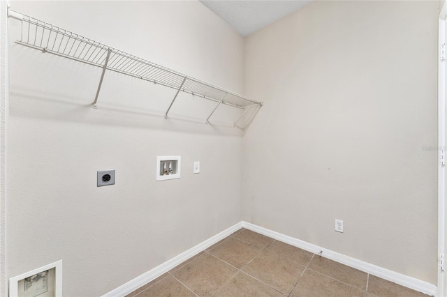 washroom featuring washer hookup, tile patterned floors, and electric dryer hookup