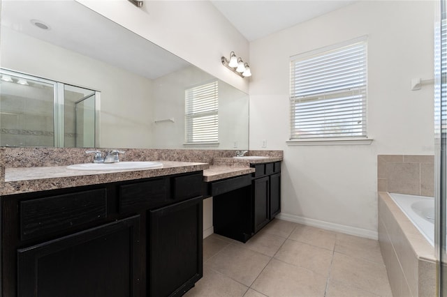 bathroom with tile patterned flooring, vanity, and independent shower and bath