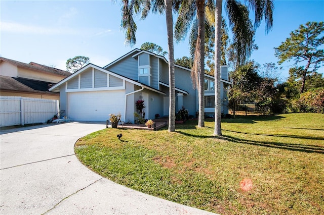 front facade with a garage and a front lawn