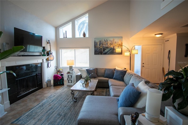 living room featuring high vaulted ceiling