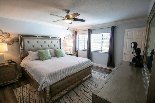 bedroom with a textured ceiling, dark hardwood / wood-style floors, ceiling fan, and ornamental molding