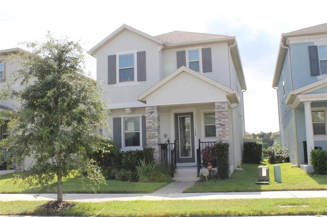 view of front of property featuring a front lawn