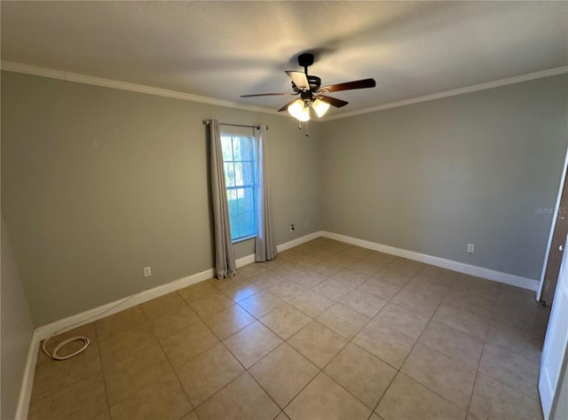 tiled spare room with ceiling fan and ornamental molding