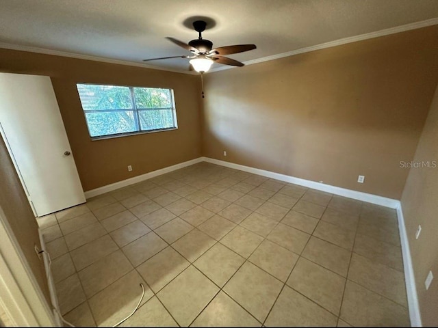 unfurnished room featuring light tile patterned floors, ceiling fan, and ornamental molding