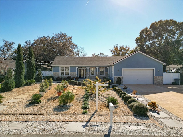 single story home featuring a garage