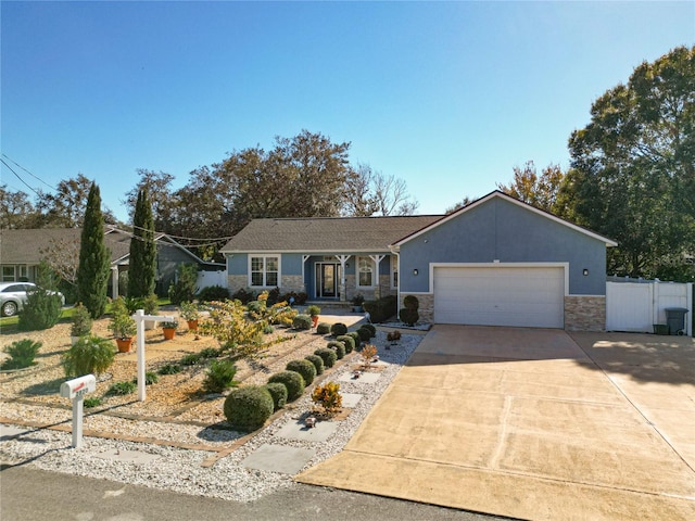 ranch-style house featuring a garage