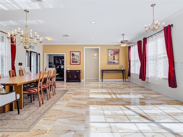 dining room featuring ceiling fan with notable chandelier and ornamental molding