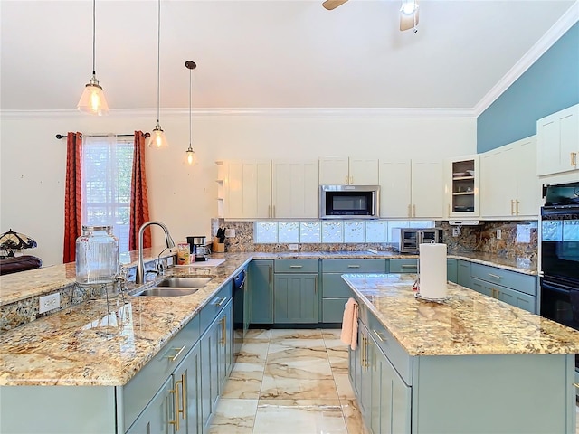 kitchen with kitchen peninsula, black appliances, sink, pendant lighting, and white cabinetry