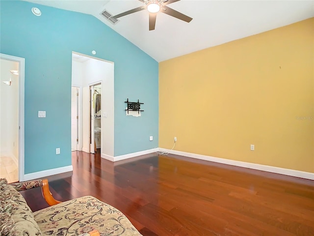 interior space featuring ceiling fan, lofted ceiling, and hardwood / wood-style flooring